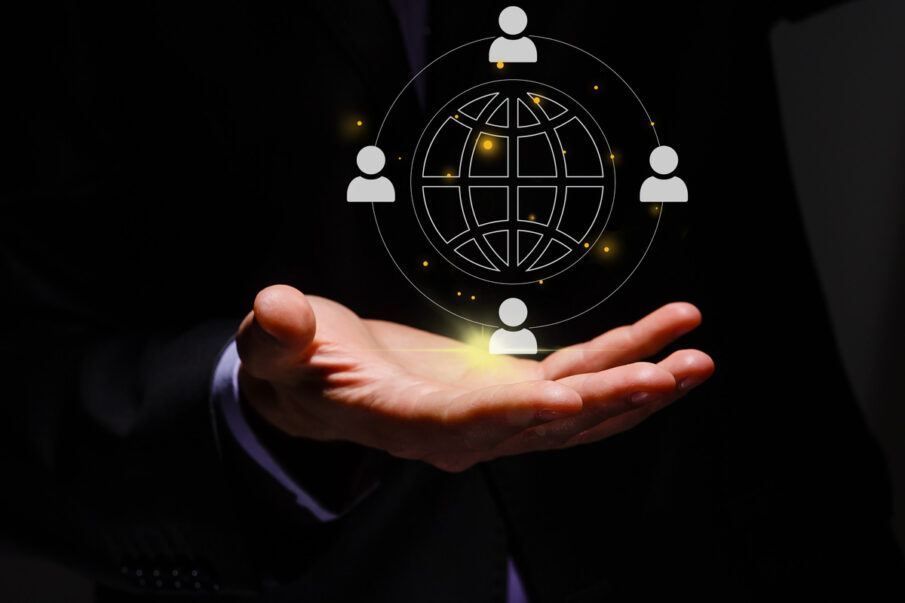 Outsourcing concept. Human resources and global recruitment for business. Person hold virtual outsourcing icon for business working and company. Midmarket CFO Strategic Outsourcing